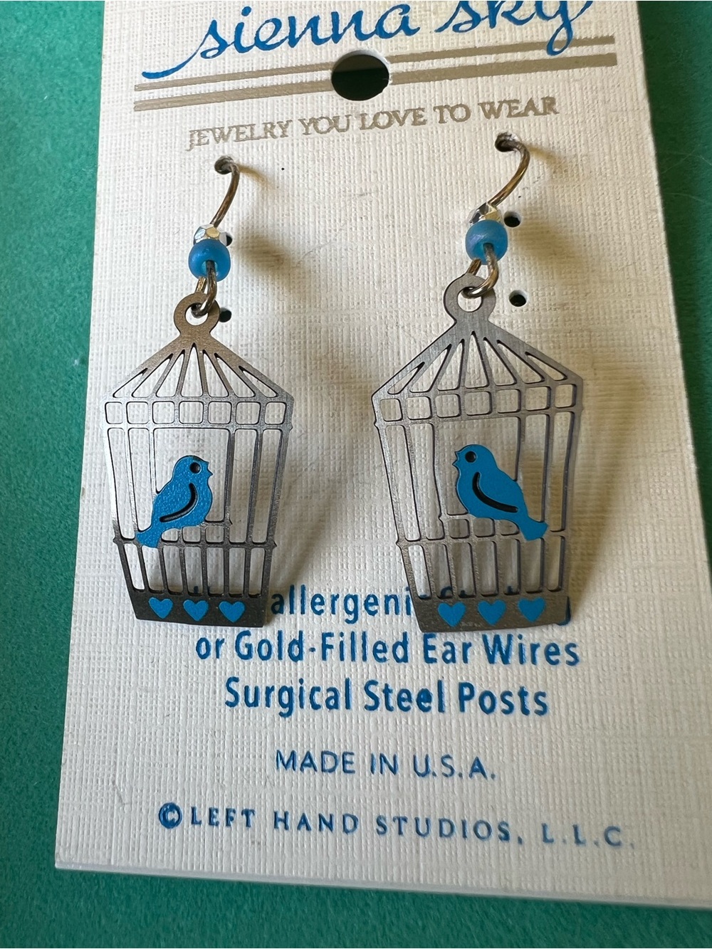 Sienna Sky Silver Birdcage Earrings with Bright Blue Birds
